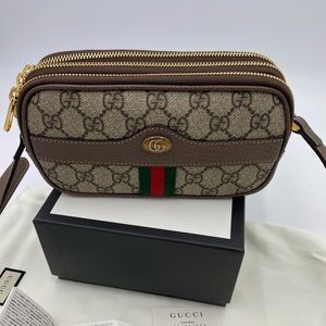 - Women’s Gucci GG mini supreme triple zip cross body bag made in Italy